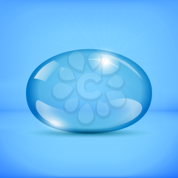 Transparent flattened water drop with blue background