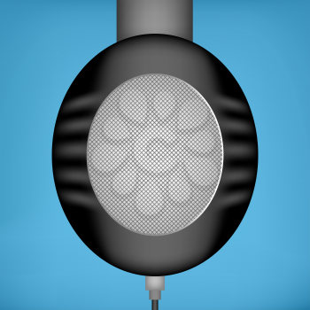 Side view of black headphones with wire, blue background