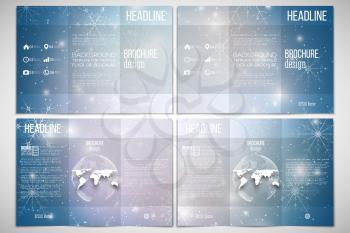 Vector set of tri-fold brochure design template on both sides with world globe element. Blue abstract winter background. Christmas vector style with snowflakes.