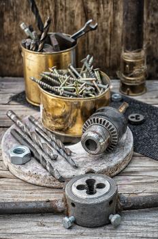 Set of old tools of the keys,screws and drills.