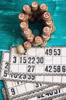 traditional legacy of the ancient Board game Lotto on wooden background