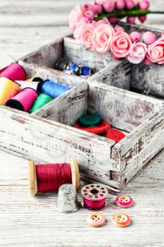 Thread and buttons with beads sewing and needlework