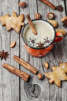 Homemade Christmas cookies with spices, and coffee with milk