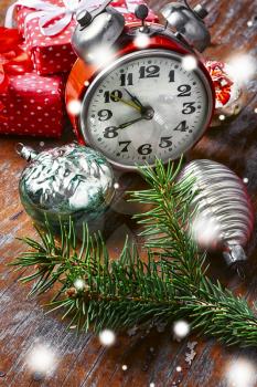 Christmas decoration with clock,fir toys and gifts