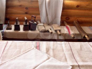 Interior in the ancient house, the typical Ukrainian clothes and kitchen devices