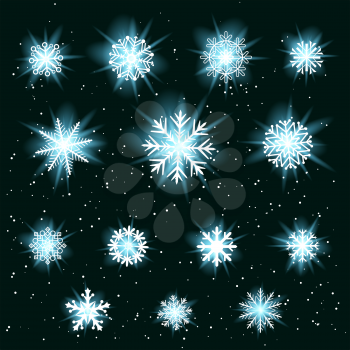 Glowing snow set. Collection of white glow snowflakes variation isolated on dark snowy background. Ice shape pattern. Winter Christmas holiday decoration