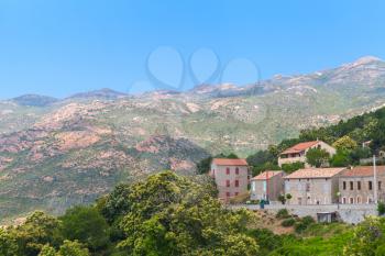 Rural Corsican landscape, old stone houses and mountains. Aullene village, Corsica, France