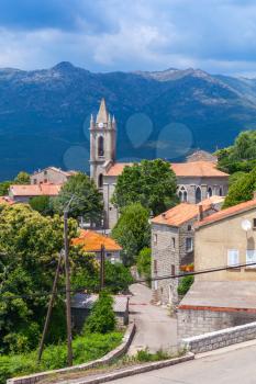 Typical Corsican village landscape, old living houses and bell tower. Zonza, South Corsica, France