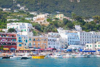 Port of Capri, Italy. Colorful houses and pleasure yachts