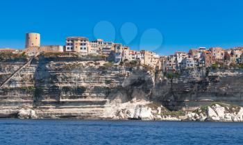 Living stone houses and fortress on the rocky coast. Bonifacio, Corsica island, France