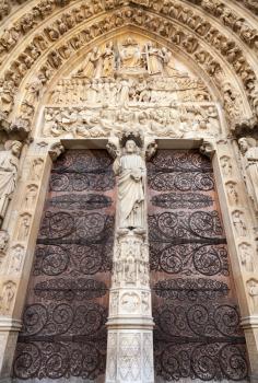 Wooden doors of Notre Dame de Paris cathedral, France