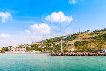 Landscape of Kavarna, coastal town and seaside resort in northeastern Bulgaria, Black Sea coast. Entrance to the port with white lighthouse tower
