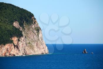 Coastal rocks with forest on it in Adriatic Sea, Montenegro