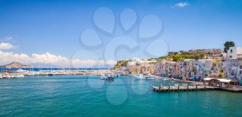 Small Italian town panoramic cityscape. Port of Procida island, Gulf of Naples, Italy
