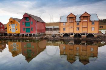 Red and yellow wooden houses in small Norwegian village
