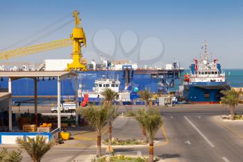 RAS TANURA, SAUDI ARABIA - MAY 14, 2014: Port view with moored ships, Saudi Arabia