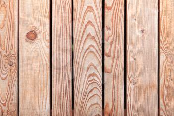 New uncolored wooden fence. Frontal flat background photo texture