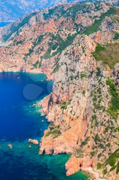 Vertical coastal landscape of Corsica island. Capo Rosso, Piana region