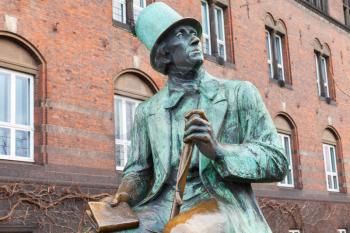 Bronze statue of fairytale author Hans Christian Andersen outside City Hall of Copenhagen, Denmark