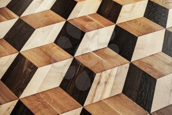 Classic old wooden parquet pattern, volume cubes illusion. Flooring background photo texture