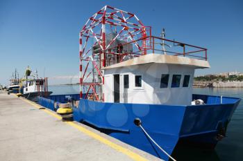 Incomplete new Fishing boat stands moored in port of Nesebar, Bulgaria
