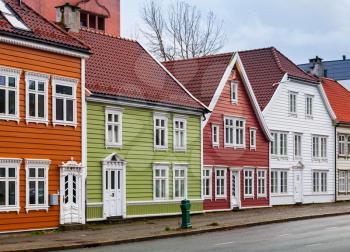 Traditional Norwegian red wooden houses. Street of old Bergen, Norway