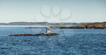 Stone Cairn, Norway. Traditional Scandinavian old navigation sea mark on rocks