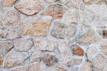 Outdoor stone wall, frontal background photo texture
