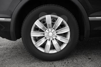 Modern car wheel, close up photo