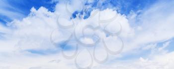 White cumulus clouds in blue sky at summer day, natural panoramic photo background texture
