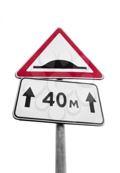 Speed Bump. Triangle road sign isolated on white background