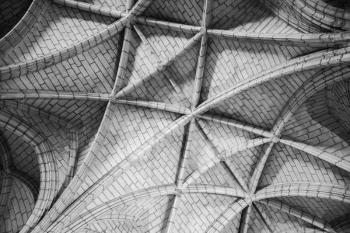 Classical gothic ceiling structure, abstract architectural black and white background photo