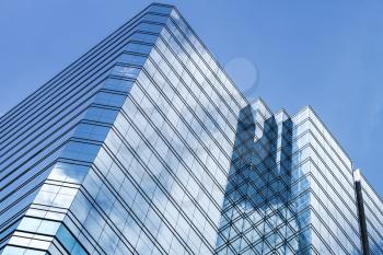 Abstract modern architecture background photo, office tower made of glass and steel