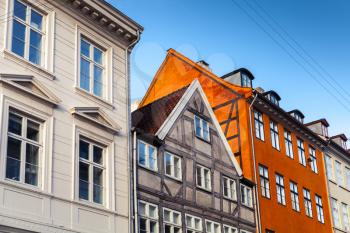 Colorful wooden houses in a row, traditional architecture style of Copenhagen old town, Denmark