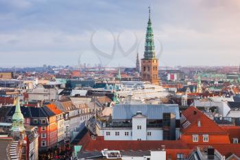Cityscape of Copenhagen with spire of City Hall, Denmark. Photo taken from The Round Tower, popular old city landmark and viewpoint
