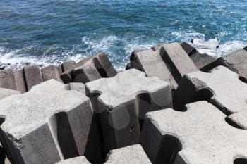 Rough concrete blocks as a part of breakwater structure for protection from ocean storm waves 