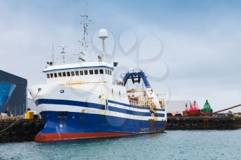 Industrial trawler ship stands moored in port of Reykjavik, Iceland