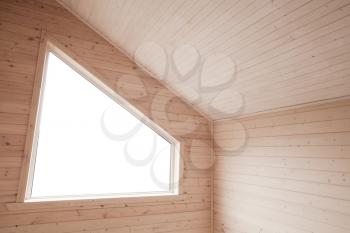 Empty new interior fragment, corner with bright window in wooden wall