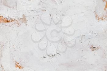 White concrete wall with rough plastering pattern, flat photo background texture