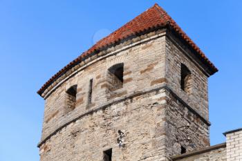 Fragment of ancient stone tower. Fortress in old Tallinn, Estonia