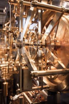 Gears of vintage world clock mechanism