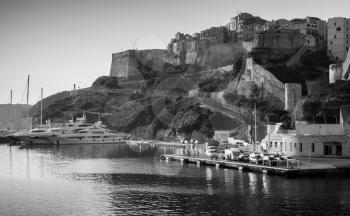 Bonifacio port, black and white coastal landscape of mountainous Mediterranean island Corsica, Corse-du-Sud, France