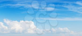 Wide blue sky, panoramic background photo, white cumulus and cirrus clouds formation