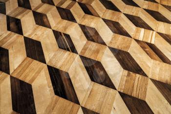 Old wooden parquet flooring design with volume cubes illusion. Background photo