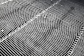 Steel grating of urban drainage system, abstract background photo