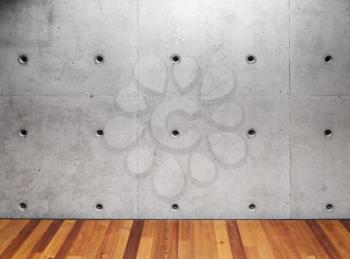 Concrete wall and wooden parquet floor. Contemporary empty interior background photo