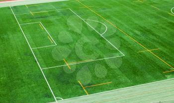 Empty soccer field is installed with an artificial turf field