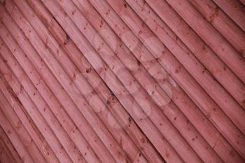 Old red wooden wall, background photo with selective focus