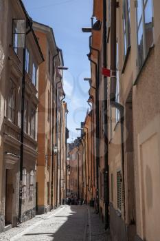 Old narrow street of Gamla stan, the old town in central Stockholm, Sweden