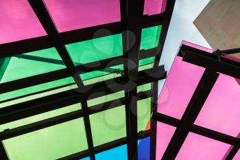 Colorful transparent roof made of glass and steel framing, abstract contemporary architecture background